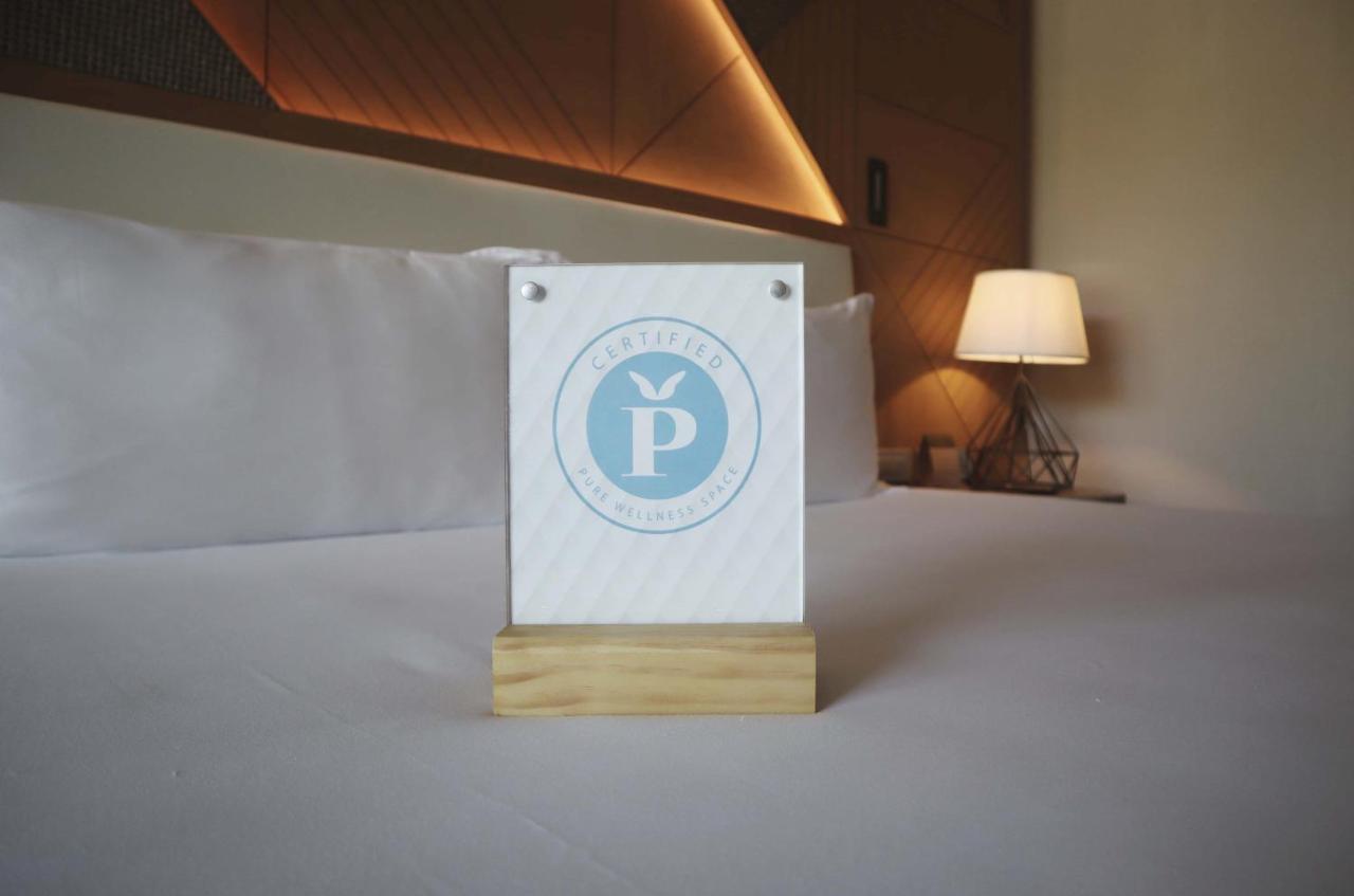 Haven Riviera Cancun (Adults Only) Alfredo V. Bonfil Buitenkant foto A sign in a hotel room